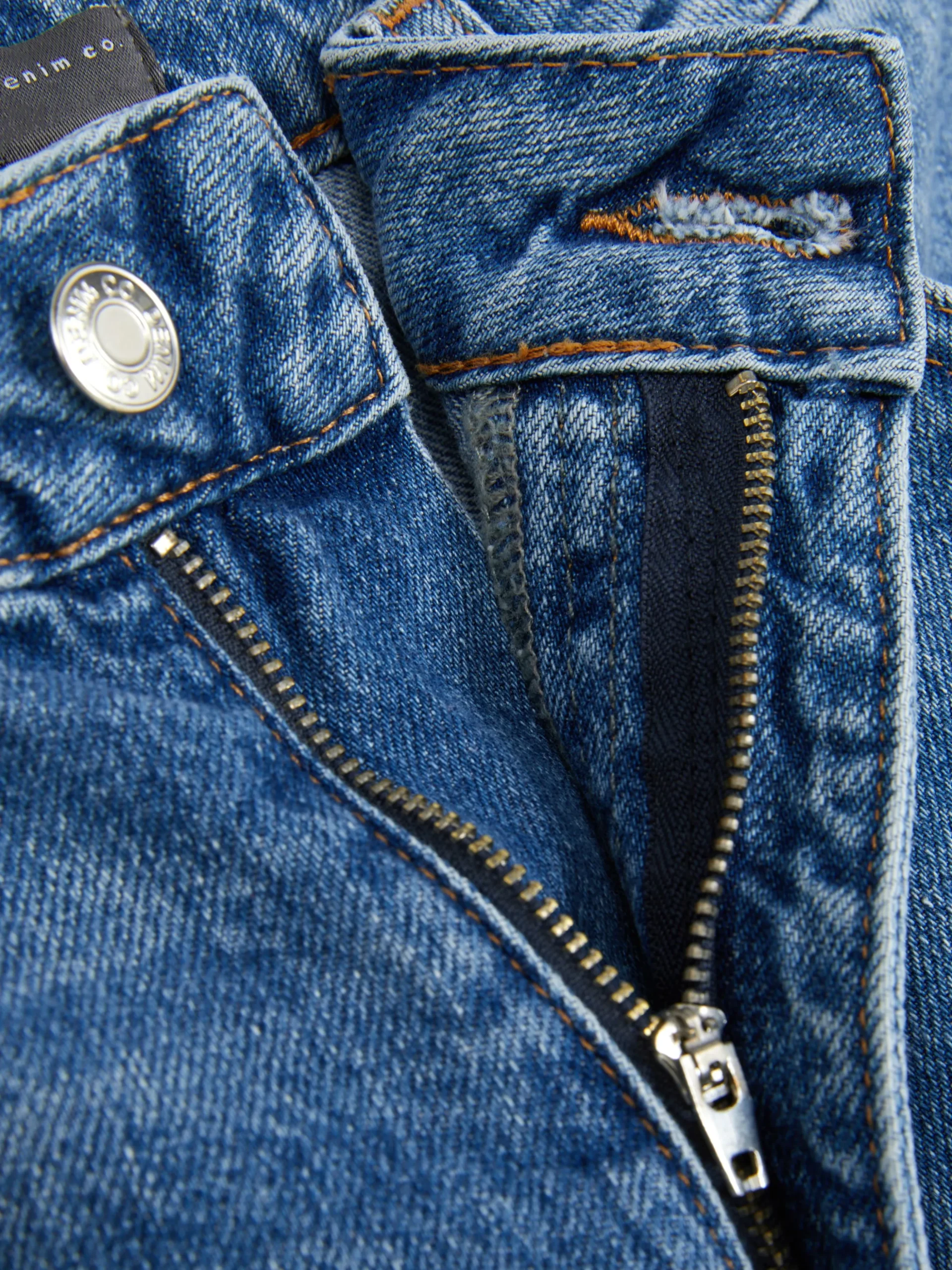 Calças Ganga Rasgadas Estilo Mom