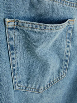 Calças Ganga Rígidas Corte Boca Sino Rasgões