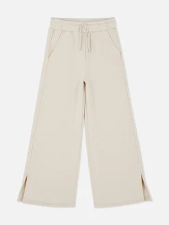 Calças Treino Corte Perna Larga