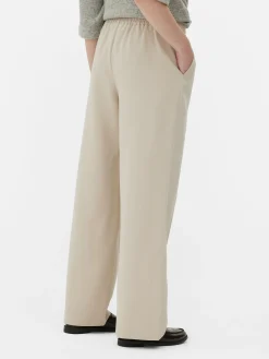 Calças Treino De Tecido Com Detalhes De Costura A Condizer