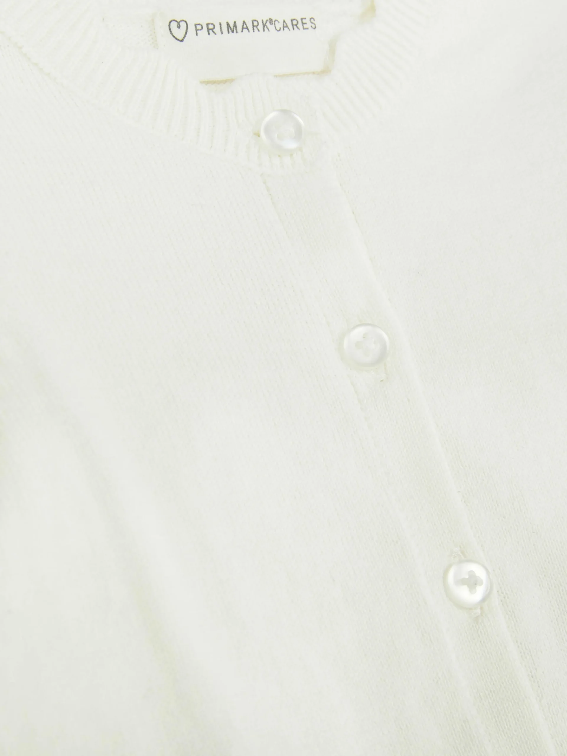 Casaco Malha Rebordo Recortado