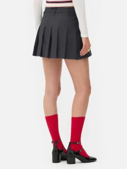 Minissaia Plissada Rita Ora