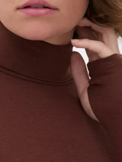 Top Manga Comprida Gola Alta Rita Ora