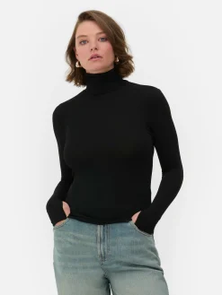 Top Manga Comprida Gola Alta Rita Ora